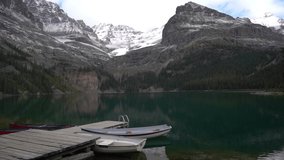 Lake O'Hara, Yoho National Park, Canada. Glacial Water Under Snow Capped Summits on Cloudy Day, Full Frame - Powered by Shutterstock - Get 15% off with code: PIKWIZARD15