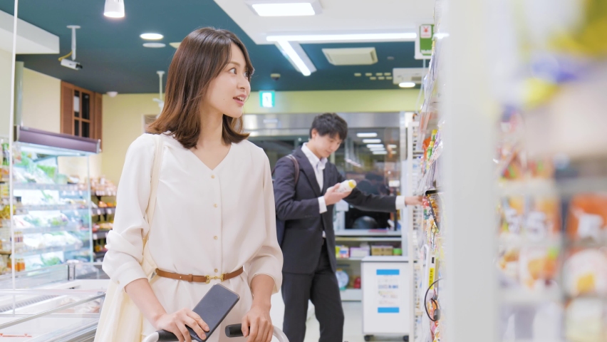 Young business person shopping at the supermarket | Shutterstock HD Video #1081904387