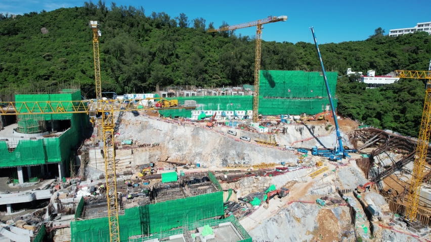 Stanley Market, a coastal town of Hong Kong, with traditional villages, beautiful scenery, water activities, beaches and islands, sea bay, pier and boats in-shore, aerial view