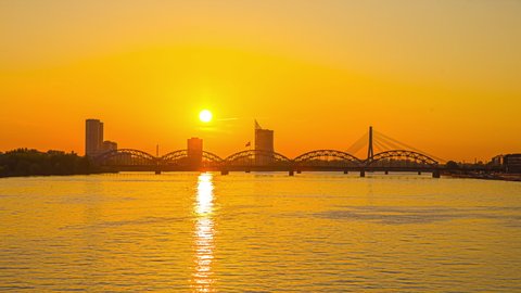 Daugava river cable stayed Vansu bridge sunset Riga Latvia timelapse