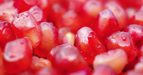 Pomegranate Seeds. 4k Footage close up of Pomegranate seeds (Punica granatum). Rotating Of Pomegranate Seeds, macro view