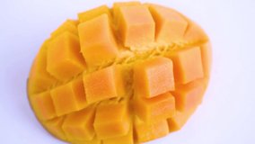 Footage of fresh mango fruit on a white background