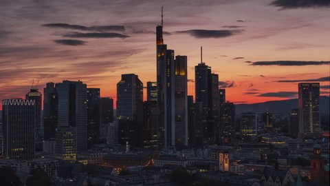 Stunning sunset, Establishing Aerial View Shot of Frankfurt am Main De, financial capital of Europe, Hesse, Germany, circling left