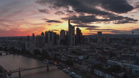 Colorful magical sunset, Establishing Aerial View Shot of Frankfurt am Main De, financial capital of Europe, Hesse, Germany, mega push in