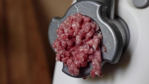 Preparation Of Minced Meat From Fresh Beef And Fresh Pork Through A Meat Grinder. Cooking Minced Meat At Home In The Kitchen.