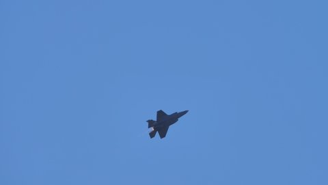 Rivolto, Italy SEPTEMBER, 17, 2021 Combat military jet plane turning left at high speeds with blue clear sky background. Lockheed Martin F-35B Lightning II Stealth Fighter Jet of Italian Air Force