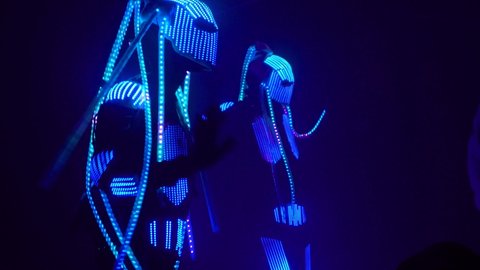 disco club dancing glowing aliens people in costumes light music