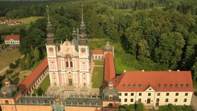 Aerial 4K video from drone to Swieta Lipka,Marian Sanctuary - Świętolipska basilica of the Visitation of the Blessed Virgin Mary - the village of Święta Lipka in Warmia and Mazury in Poland, Europe.