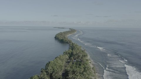 Drone footage of Pacific Island nation Tuvalu which is suffering from climate change and rising sea waters. A beautiful beachside and city landscape that is afflicted with a modern problem.