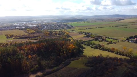 Aerial view of rural landscape near castle Tocnik in autumn time, Czech republic. High quality FullHD footage