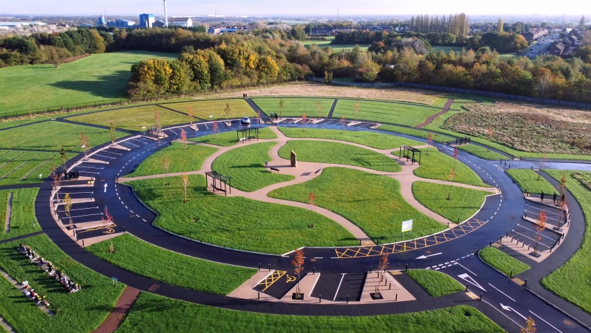 Modern circular cemetery pathway design aerial view artistic garden of rest flyover
