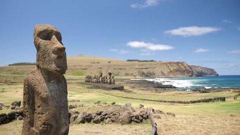 Moai statues Ahu Tongariki side on Easter Island, Chile. Statues of Easter Island in Chile. Mysterious Giant megalith Moai statues. Stunning shot of mysterious monoliths on a perfect sunny day.