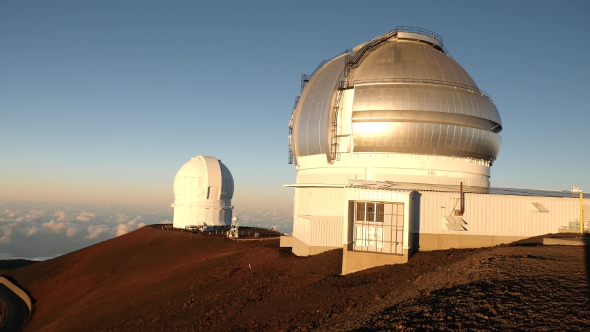 4k footage of astronomic telescopes on Mauna Kea summit at sunset, Big Island, Hawaii. Mauna Kea Observatories or Observatory. Royalty-Free Stock Footage #1082043191