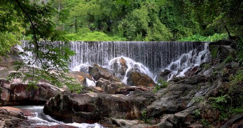Waterfall in the beautiful deep forest of Thailand.
