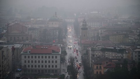 the Main Street of Bergamo from below on a foggy day