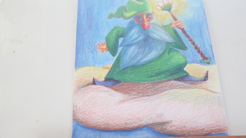 girl drawing wizard uzing blue pencil on easel