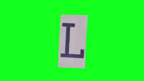 4K Stop Motion - paper with letter L moving on green screen background. More elements in our portfolio.