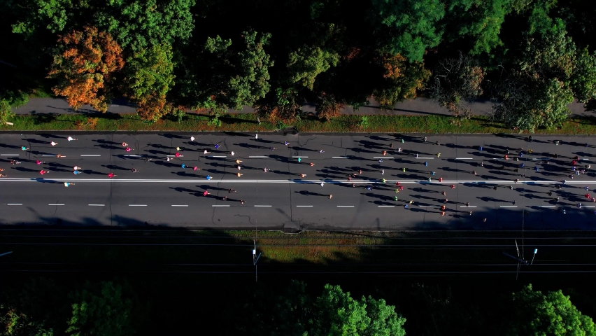 Marathon running on street. 4K Aerial drone fooage. Top view Royalty-Free Stock Footage #1082087096