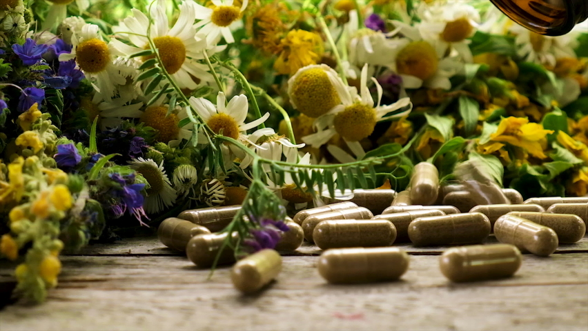 Medicinal herbal extracts and dietary supplements. Selective focus. | Shutterstock HD Video #1082088149