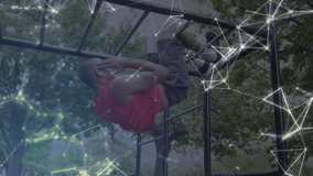 Animation of communication network over male athlete with prosthetic leg exercising on monkey bars. sport, achievement and communication technology concept, digitally generated video. - Powered by Shutterstock - Get 15% off with code: PIKWIZARD15