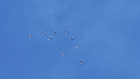 Thiene Vicenza Italy OCTOBER, 16, 2021 Acrobatic team formation splits in nine different directions. The spectacular opening of the bomb. Aermacchi MB-339 of Frecce Tricolori