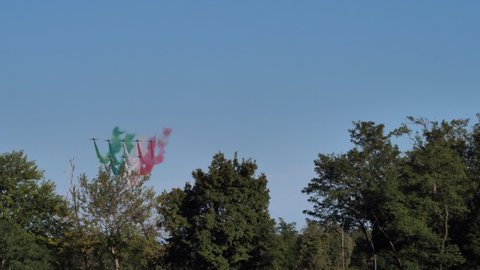 Thiene Vicenza Italy OCTOBER, 16, 2021 Frecce Tricolori draw the red white and green italian flag in the blue sky. Aermacchi MB-339 of Frecce Tricolori