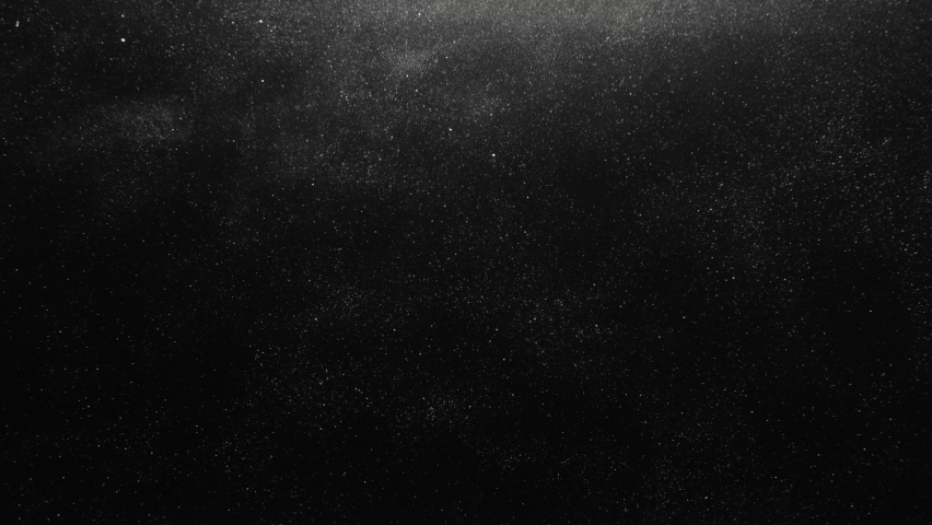 Dust background. Night snow. Galaxy stardust storm. Universe space. Silver shiny glitter particles floating on dark abstract overlay. Royalty-Free Stock Footage #1082100869
