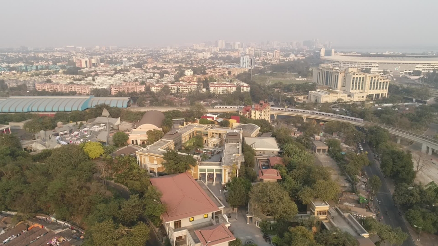 Aerial view of Swabhumi Hotel with metro rail passing in the backside in Kolkata, India | Shutterstock HD Video #1082106848