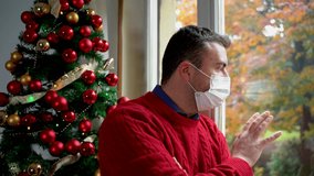 This video is about man staying at home at Christmas during coronavirus pandemic