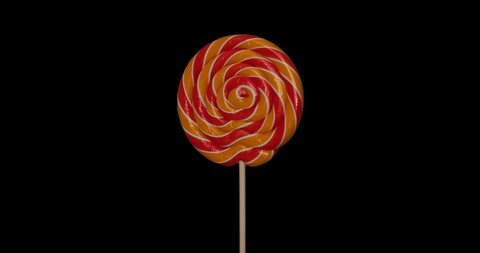 Round coloured lollipop on a stick rotates on alpha channel isolate black background. You can paste this object on any background