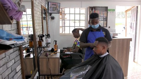 Nairobi, Kenya - ‎September ‎6, ‎2021: Small business Barber shop in Africa