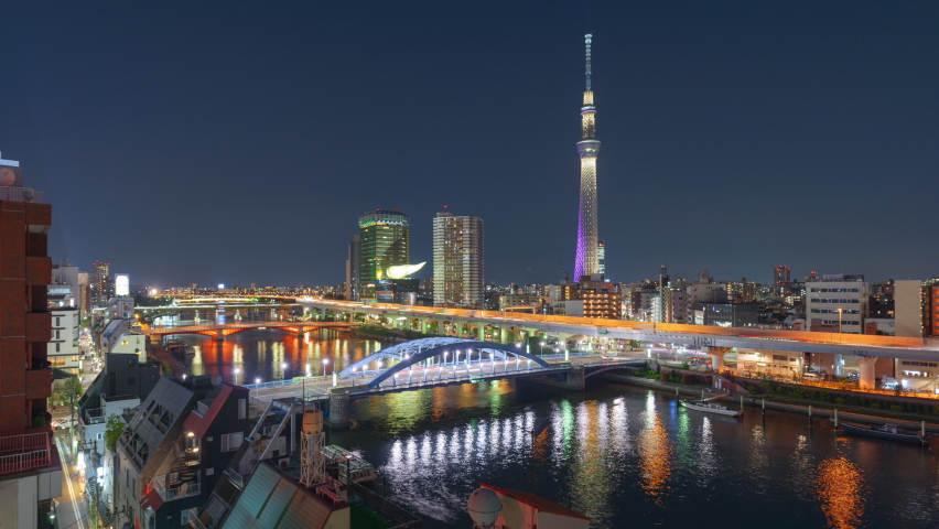 Tokyo, Japan skyline on the Sumida River at night. Royalty-Free Stock Footage #1082127086
