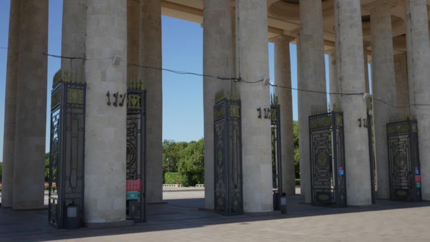Entrance group with columns of Gorky Park in the summer during Lockdown Covid-19. Shooting in motion