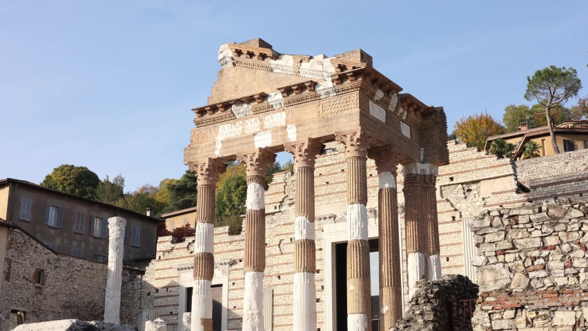 Brescia, Italy - October 29, 2021: the pediment of the Roman temple of Brescia today the museum of Santa Giulia in a sunny day