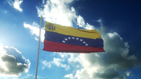 Flag of Venezuela waving at wind against beautiful blue sky