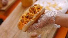 Irresistible chili cheese Hot Dogs. 4k video