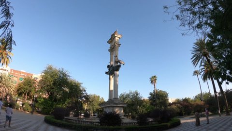 Seville, Spain, September 11, 2021: DOLLY SHOT- The Christopher Columbus Monument is located in the Jardines de Murillo.