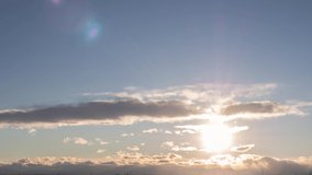 Timelapse sunset sky. Soft blue pastel sunrise clouds sky. Panoramic view winter sun. 4k Footage sun Ray sunbeam and clouds. Cloudscape nature background. Gradients blue heaven atmosphere b roll video