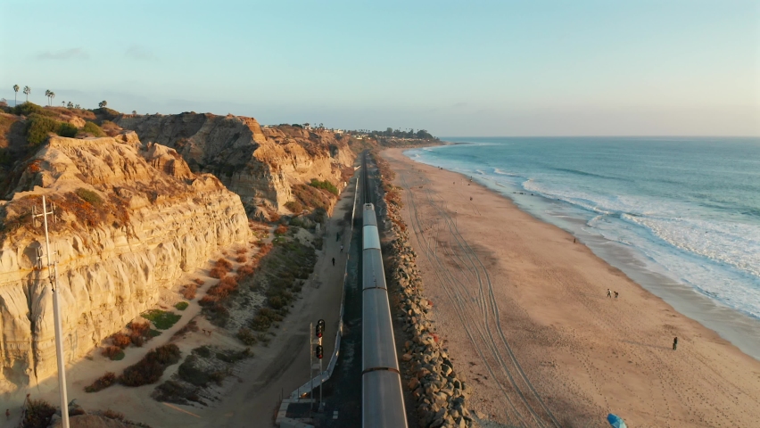 Aerial view of an Amtrak train passing under in San Clemente California