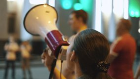 Demonstration feminism riot protester. Stop. Feministic woman activist megaphone picket march. No. Anti. Female feminist speaks bullhorn protest crowd march on political rally. Feminized girl revolt. - Powered by Shutterstock - Get 15% off with code: PIKWIZARD15