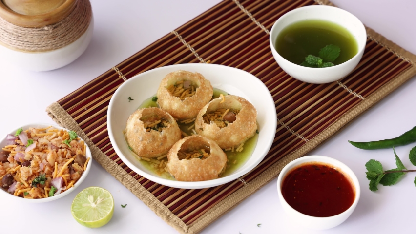 Pani puri a chat item in India. North Indian street food snacks. Royalty-Free Stock Footage #1082187005