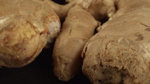Fresh ginger root with a spicy smell. High content of essential oils in the plant. Medicinal herbs. The use of ginger in aromatherapy. High quality. 4k footage.