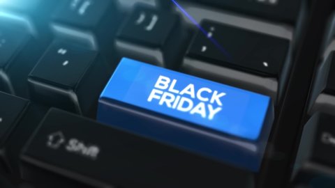 Camera movement over a computer keyboard with a blue enter button with the inscription Black Friday. Black Friday video.