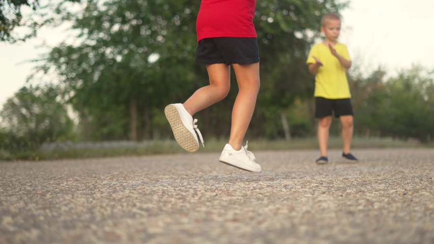 Hop scotch. Playing on the Asphalt with children.