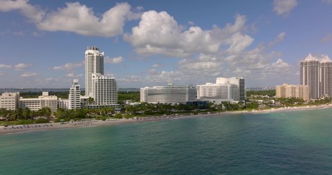 Miami Beach hotels in danger of flooding from water level rise. 5k drone video Florida USA