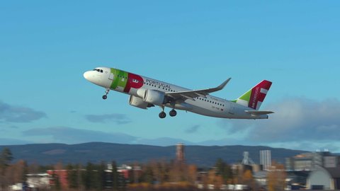 Oslo Airport Norway - October 27 2021: airplane airbus 320 neo air portugal tap take off sunny day