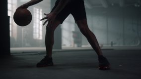 Unrecognizable silhouette basketball player legs play basket ball in sport club. Professional sport man hands bouncing basketball ball indoors. Male athlete dribble ball at streetball game training - Powered by Shutterstock - Get 15% off with code: PIKWIZARD15