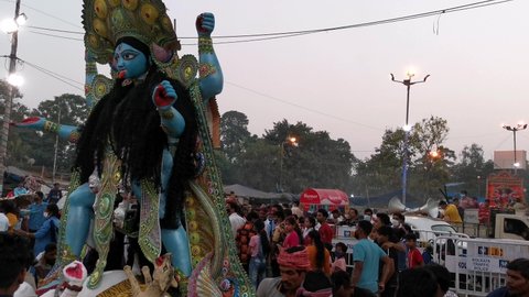 Video taken on 7th.  November 2021 at 17:15 pm on the bank of river Hooghly Kolkata India.  Video shows the goddess kali idol is being taken to river for impression.