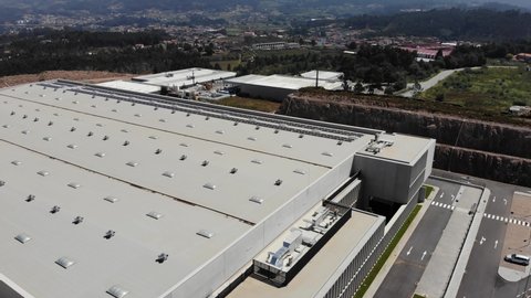 Santo Tirso, Portugal, August 15, 2021: DRONE AERIAL FOOTAGE: Stelia Aerospace, owned by European planemaker Airbus, new assembly line in Portugal. 