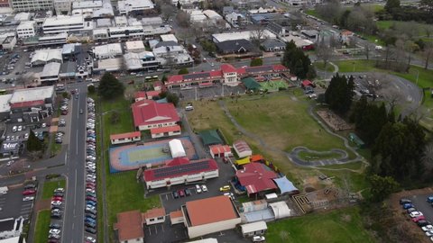Aerial orbit of High School in Rotorua city, New Zealand